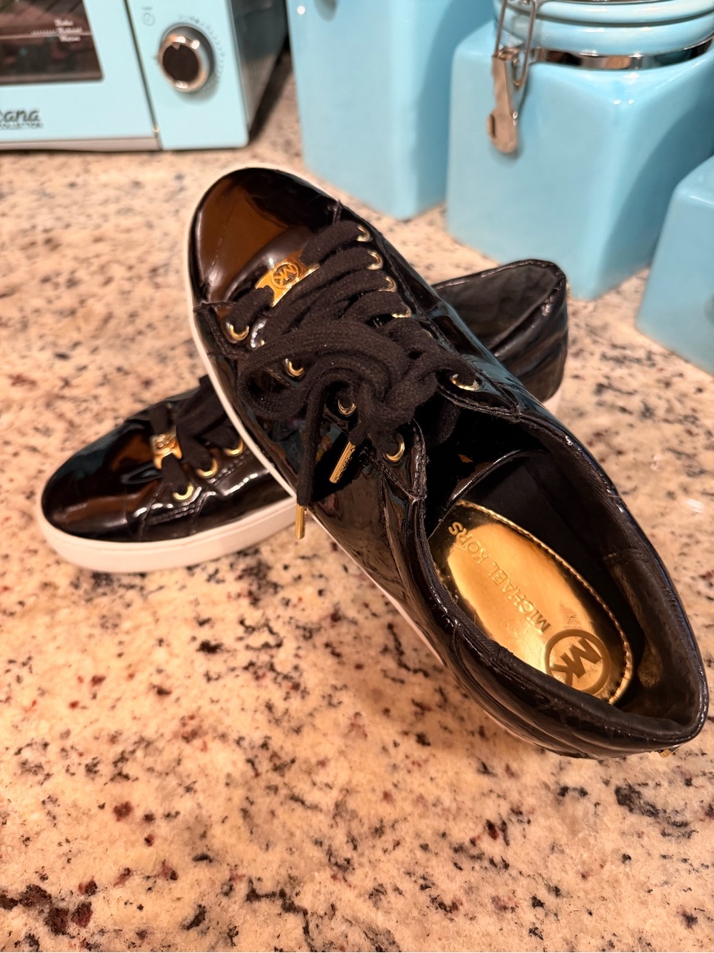 Michael Kors Size 8M  Black Patent Sneakers with Gold Accents